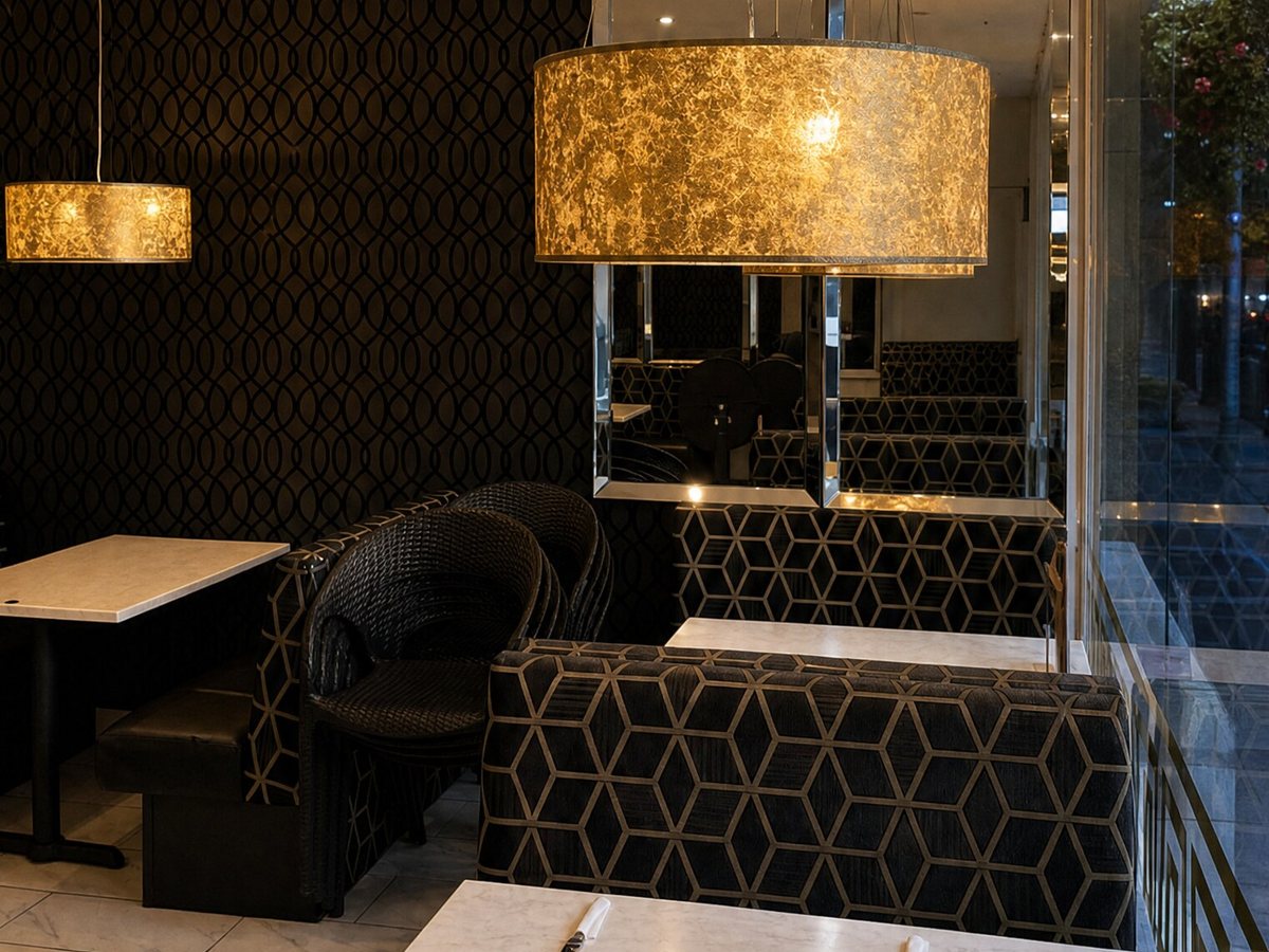 Warm lighting over marble tables
